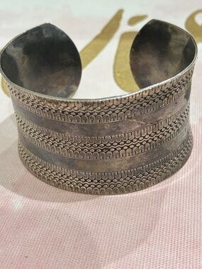 Silver Tone Wide Cuff Bracelet with Intricate Patterns
